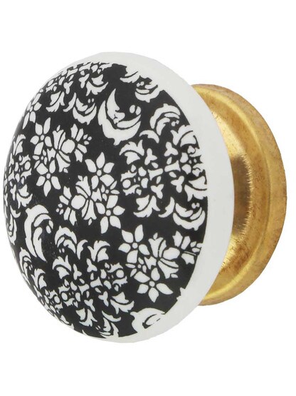 White Porcelain Floral Cabinet Knob with Brass Base in Un-Lacquered Brass.